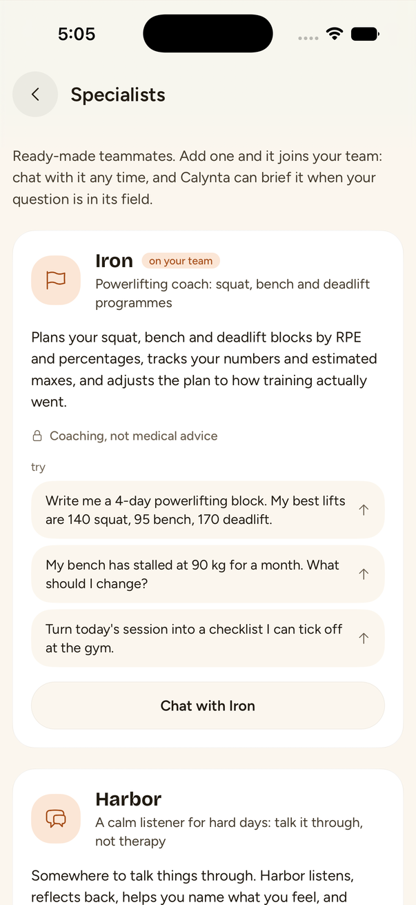 The Specialists screen on an iPhone: Iron, a powerlifting coach already on the team, with its limit, three things to try, and a Chat with Iron button; Harbor below it.